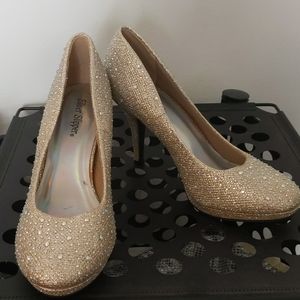 Gold and rhinestone heels
